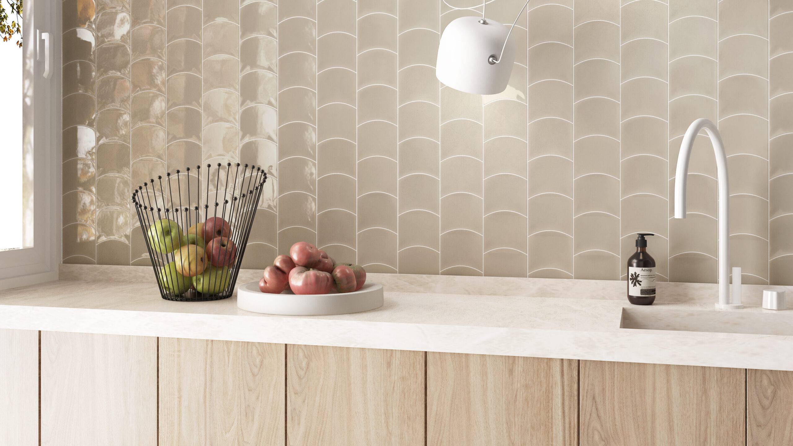 A bright, modern kitchen with a beige wave-shaped tile backsplash.